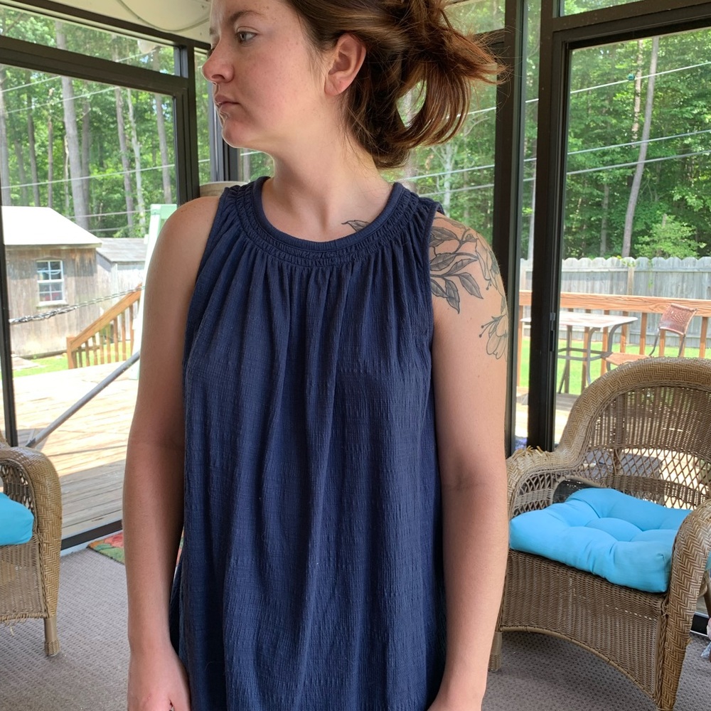 Population flower dress with holes.